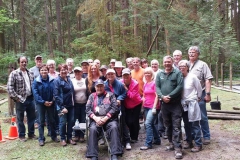A group of HHA members pause during a workbee for a photo